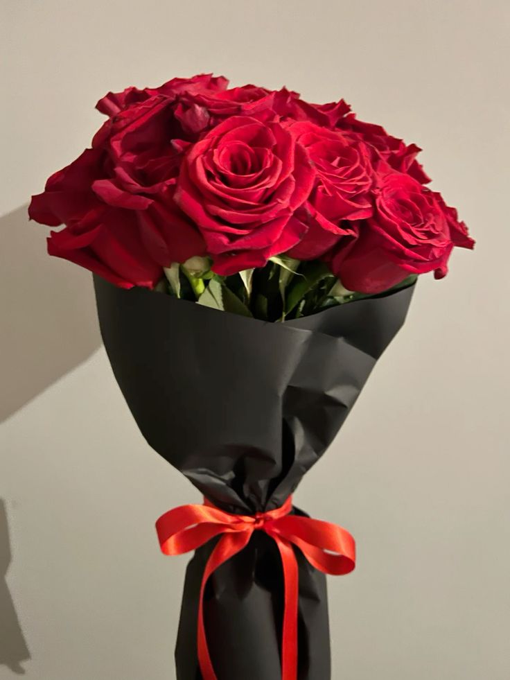 Amour Rouge bouquet — Red roses, dressed for the night