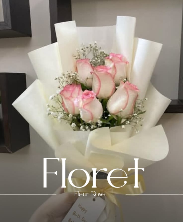 Fleur Rose bouquet — A white rose says what the heart cannot