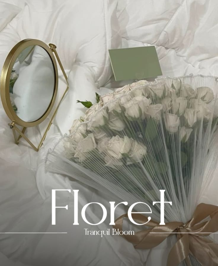 Tranquil Bloom bouquet — A hundred tiny white roses, hushed under sheer veil
