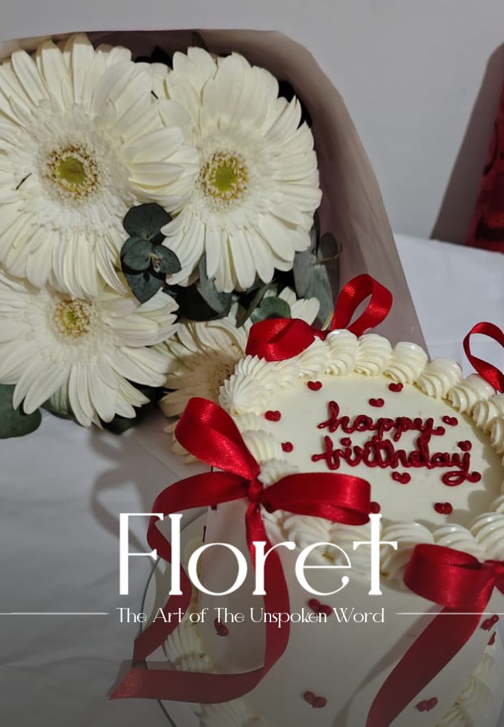 The Art Of Unspoken Word bouquet — White gerberas and a scarlet-ribboned cake — everything you couldn't say, said anyway